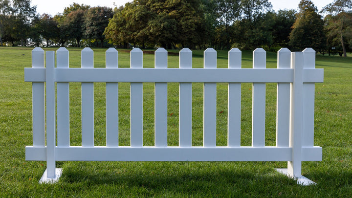Portable picket fence panel with heavy duty steel mounts, 6ft x 2ft 8in white vinyl fencing by Simple Fencing.