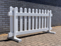 White Vinyl Temporary Picket Fence, portable design, measuring 6 feet (1.83 meters) in width and 2.75 feet (0.84 meters) in height.
