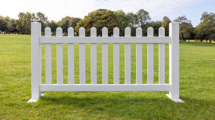 Square image of Portable Classic Straight Picket Fence Panel in white PVC vinyl with Gothic-style pointed pickets and steel mounts, 6ft x 3ft 5in (180cm x 104cm) by Simple Fencing.